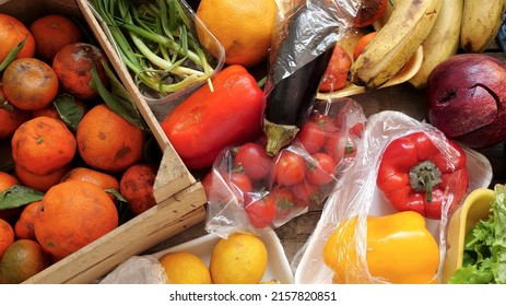 Food Waste. Fruits And Vegetables Are Wasted By Suppliers, Retailers, And Consumers. Throwing Out Food That Cant Be Sold. Discarded Unsold Damaged Fruits And Vegetables In Packages