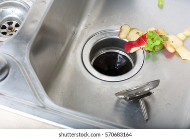 Food waste left in a sink. Closeup - Shutterstock ID 570683164