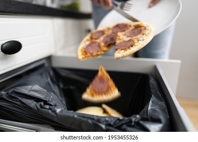 Food Waste. Throw Away Pizza In Dustbin