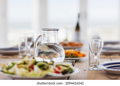 Food And Water On Set Table