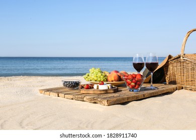 Food And Wine On Beach. Summer Picnic