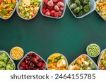 Food in winter, freezing fresh vegetables in summer in the refrigerator, various frozen vegetables in plastic dishes above and below green background, copy space