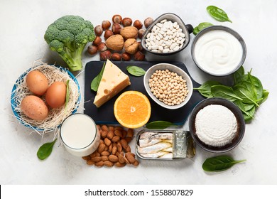 Foods High in Calcium for bone health, muscle constraction, lower cancer risks, weight loss. Top view 