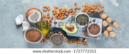 Foods high in plantbased fats. Alternative oils concept. Vegan and vegetarian fats. Top view, panorama, banner