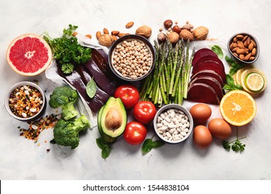 Foods high in vitamin B9. Healthy food, sources of folic acid. Top view with copy space