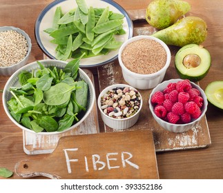 Foods rich in Fiber on  wooden background. Healthy eating. Top view - Shutterstock ID 393352186