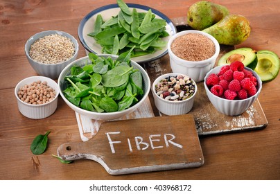 Foods rich in Fiber on a wooden table. Healthy eating. Selective focus - Shutterstock ID 403968172