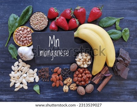 Foods rich in manganese with the chemical symbol Mn for the chemical element manganese. Natural sources of manganese include garlic, nuts, spinach, clove, black pepper, lentil, bean, strawberry, etc