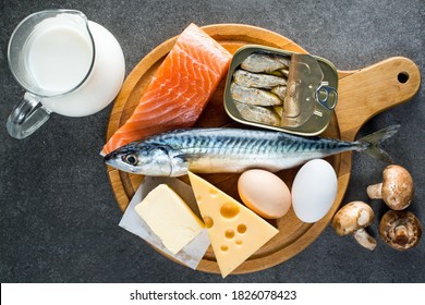 Foods rich in natural vitamin D as fish, eggs, cheese, milk, butter, mushrooms, canned sardines