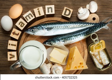 Foods rich in natural vitamin D as fish, eggs, cheese, milk, butter, mushrooms, canned sardines