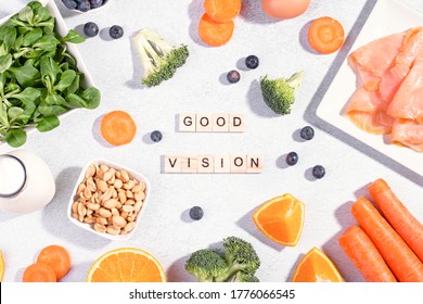 Foods That Help Maintain Eyes Healthy, Supplements For Keeping Good Vision, Vitamins For Eyes. Assortment Of Food For Eye Health On Concrete Background, Flat Lay, Top View