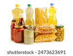 Foodstuff for donation isolated on white background with clipping path, storage and delivery. Various food, pasta, cooking oil and canned food in cardboard box.