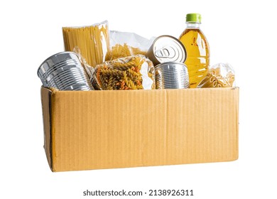 Foodstuff For Donation, Storage And Delivery. Various Food, Pasta, Cooking Oil And Canned Food In Cardboard Box.