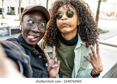 Foolish Selfie Of Two Young Women, Generation Z People Using Smart Phone For Taking Selfie, Carefree People Having Fun With Posting Photos On Social Network