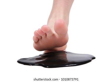 Foot Crushing Stain Of Tar On White Background