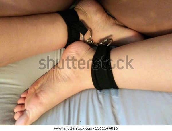 Handcuffs With Bound Feet