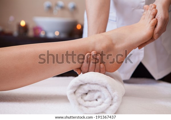 Foot Massage Female Hands Giving Massage Foto Stock 191367437