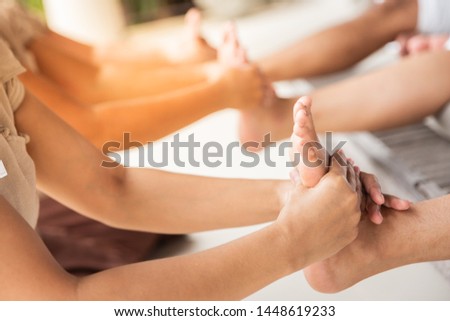 Foot massage for relaxing on holiday with friends  
Spa family