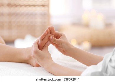 Foot Massage In Spa Salon, Closeup