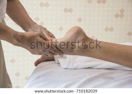 Similar – Hands massaging female abdomen.