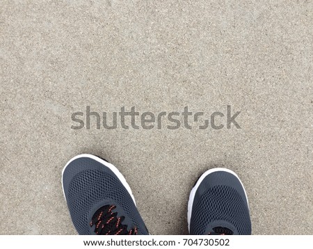 Foot on cement floor for background