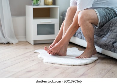 Foot Pain, Man Suffering From Feet Ache In Home Interior, Podiatry Concept