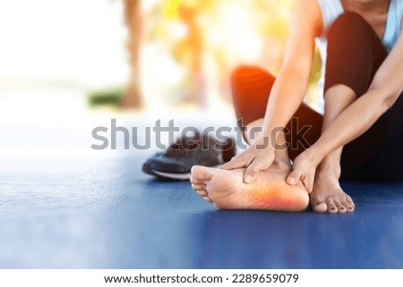 Foot pain, plantar fasciitis pain in the foot of the elderly. Symptoms of peripheral neuropathy. Most symptoms are numbness in the fingertips and foot.Healthcare problems and podiatry medical concept