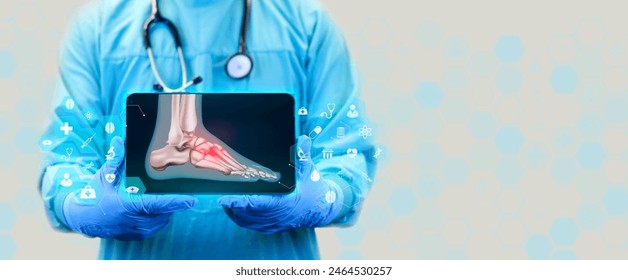 Foot pain, top, inflammatory, arthritis, fracture, nerve compression, tarsal tunnel syndrome. The doctor shows the x-ray of the foot bone in digital format, through a tablet - Powered by Shutterstock