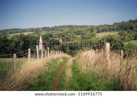 A foot path outside Shere village, looking towards the North Downs, Surrey, England