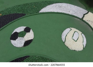 Foot Reflexology Massage By Stepping On Sharp Stones. The Egg Pebbles Are Arranged And Cemented In A Circular Pattern To Create An Attractive Foot Reflection Walkway In The Fitness Corner Area.