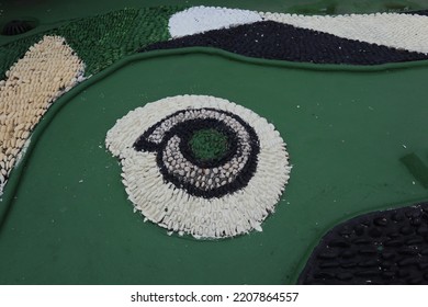 Foot Reflexology Massage By Stepping On Sharp Stones. The Egg Pebbles Are Arranged And Cemented In A Circular Pattern To Create An Attractive Foot Reflection Walkway In The Fitness Corner Area.