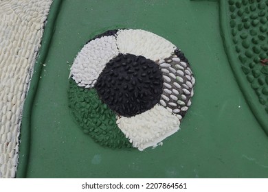 Foot Reflexology Massage By Stepping On Sharp Stones. The Egg Pebbles Are Arranged And Cemented In A Circular Pattern To Create An Attractive Foot Reflection Walkway In The Fitness Corner Area.