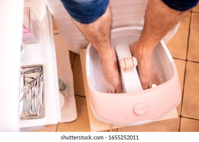 Foot Spa Tub, Feet Pedicure, Male Legs In A Foot Bath Tub  