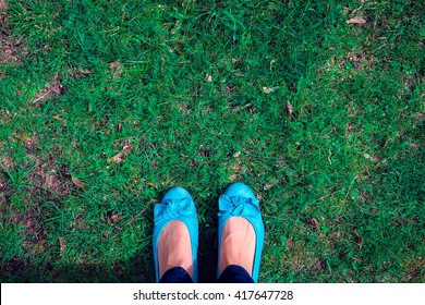 Foot standing on the Grass seen from Above, Free Space for Text