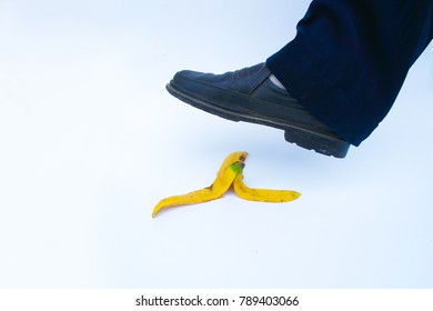 The Foot Is Stepping On The Banana Peel. 