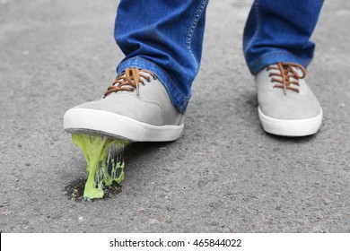 Foot Stuck In Chewing Gum On Street