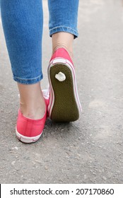 Foot Stuck Into Chewing Gum On Street