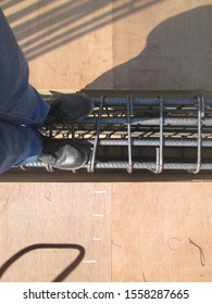 
a foot trampling column frame