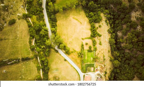 Footage B Roll Of Aerial View Drone Flying Above Landscape Serpentine Winding Road. Drone 4K Video, Road Winding On The Mountains In Summer Sunny Day