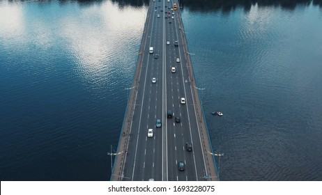 footage of bridge or road with car around river traffic bridge construction transportation travel transport freeway overhead flow vehicle crossing view landscape water