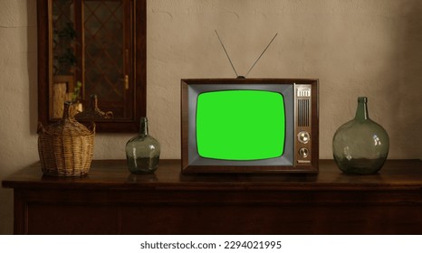 footage of Dated TV Set with Green Screen Mock Up Chroma Key Template Display, Nostalgic living room with furniture and old mirror, Chroma Key, retro style Television, vintage evening tv concept - Shutterstock ID 2294021995