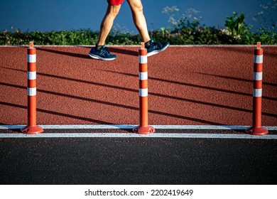 Footage Of A Person Walking On A Synthetic Rubber Treadmill.