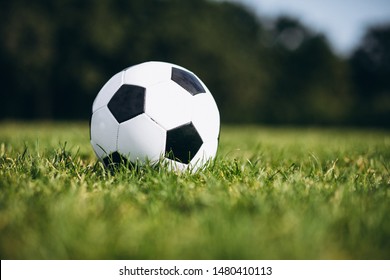 Football Ball At The Field Alone Isolated