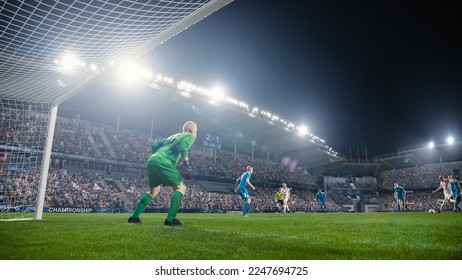 Football Championship: White Team Forward Hits the Ball and Scores Perfect Goal. Goalkeeper Jumps, Fails to Catch, Protect Goals. Crowd of Fans Cheers. Beautiful Cinematic Edit.