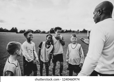 Football Coach Training His Students