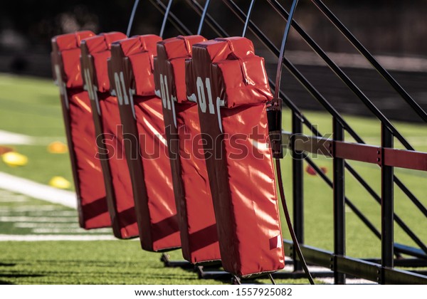 Football\
equipment used for practice on a\
field.