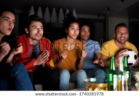 Football fans in anticipation of victory