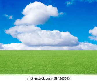 football field blue sky with clouds - Shutterstock ID 594265883