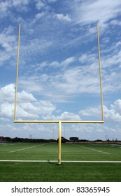 Football Field Goal Posts With A Cloudy Sky