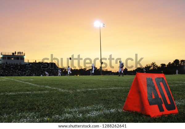 Football Field Night Game\
Sideline